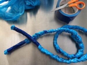jump ropes making using blue plastic bags